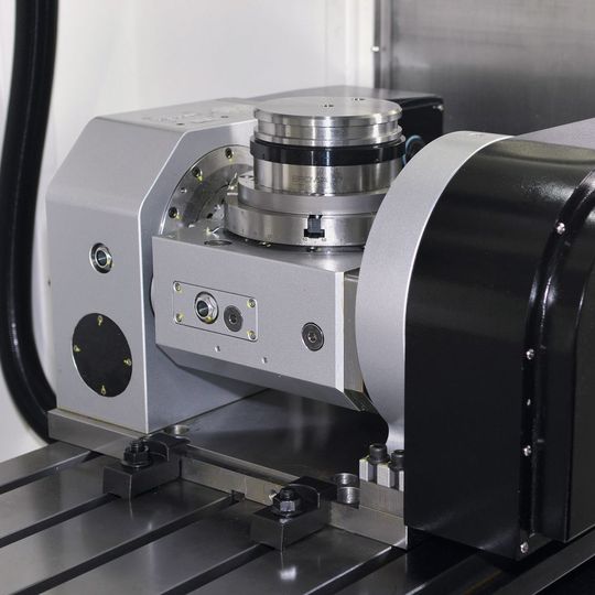 A Detron five-axis rotary table mounted on a machine bed: The Detron series is ideal for heavy five-axis, cutting operations. A Detron five-axis rotary table mounted on a machine bed: The Detron series is ideal for heavy five-axis, cutting operations.
