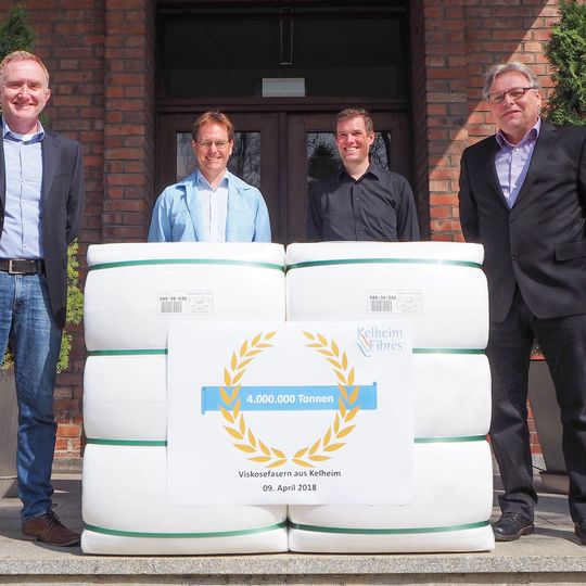 Production Manager Konrad Brunner (right) and a part of his team present the 4,000,000th tonne of viscose fibres produced by Kelheim Fibres. Production Manager Konrad Brunner (right) and a part of his team present the 4,000,000th tonne of viscose fibres produced by Kelheim Fibres.