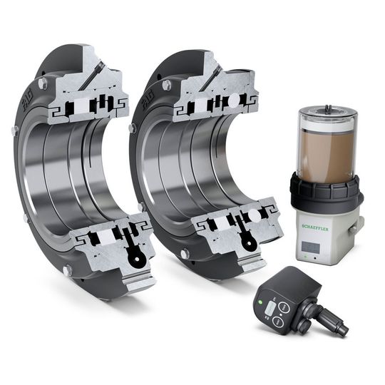 FAG-Flanschlager-Gehäuseeinheiten FERS (links) und FERB (rechts) mit Servicepaket für Elektromotoren: Condition Monitoring System Smart Check und Schmierstoffgeber Concept2. FAG-Flanschlager-Gehäuseeinheiten FERS (links) und FERB (rechts) mit Servicepaket für Elektromotoren: Condition Monitoring System Smart Check und Schmierstoffgeber Concept2.