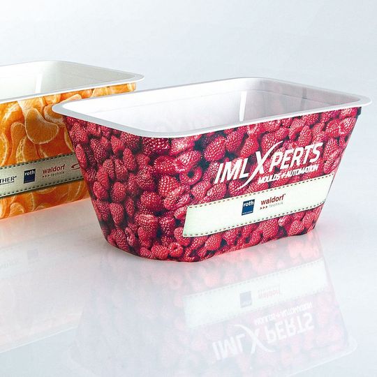 In-mould labelling enables high packaging quality. The plastic label is placed in the injection mould before injection. In-mould labelling enables high packaging quality. The plastic label is placed in the injection mould before injection.