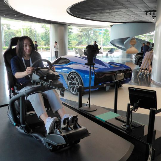 Nio setzt in seinem Boutique-artigen Store in Peking auf Design und Technik. Nio setzt in seinem Boutique-artigen Store in Peking auf Design und Technik.