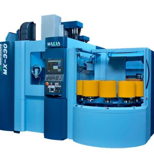 Claimed to be the sole entry level 5-axis machine with a 10 pallet changer, the MX-330 5-Axis Vertical Machining Center proves useful for high precision industries. Claimed to be the sole entry level 5-axis machine with a 10 pallet changer, the MX-330 5-Axis Vertical Machining Center proves useful for high precision industries.