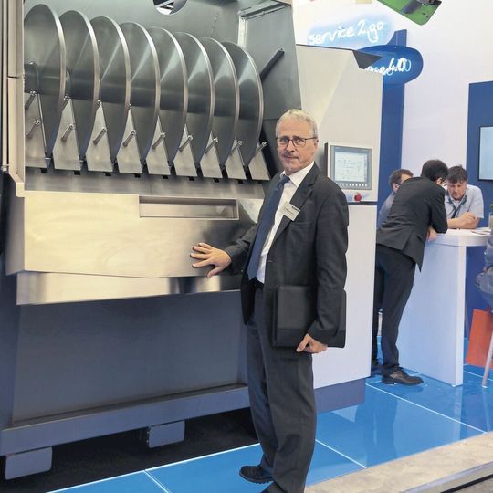 Mathias Trojosky, director of R&D at Allgaier Process Technology, shows the CD Dryer's disk assembly. Mathias Trojosky, director of R&D at Allgaier Process Technology, shows the CD Dryer's disk assembly.