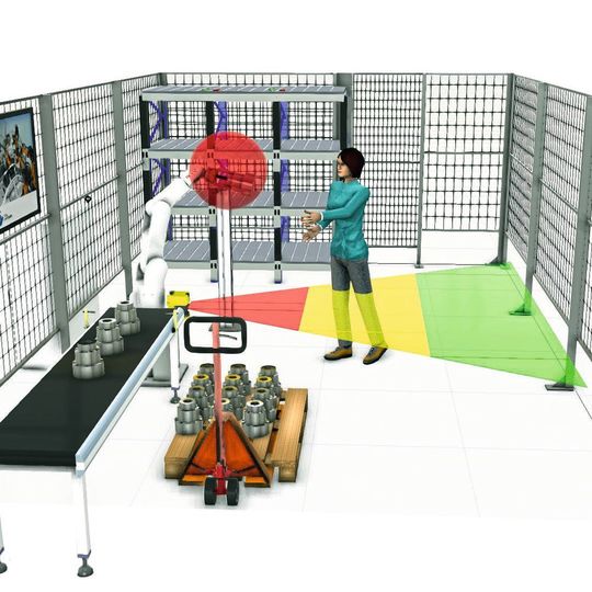 Dreidimensionales Mock-up einer MRK-Anwendung: Gefahr für die Werkerin geht vom Werkzeug am Roboterarm aus (roter Kreis). Als Sicherheitsmaßnahme ist ein Laserscanner, am Fließband befestigt, vorgesehen, der die Werkerin erkennt. Im grünen Bereich droht ihr keine Gefahr, im gelben bewegt sich der Roboter langsamer und im roten wird er angehalten. Dreidimensionales Mock-up einer MRK-Anwendung: Gefahr für die Werkerin geht vom Werkzeug am Roboterarm aus (roter Kreis). Als Sicherheitsmaßnahme ist ein Laserscanner, am Fließband befestigt, vorgesehen, der die Werkerin erkennt. Im grünen Bereich droht ihr keine Gefahr, im gelben bewegt sich der Roboter langsamer und im roten wird er angehalten.