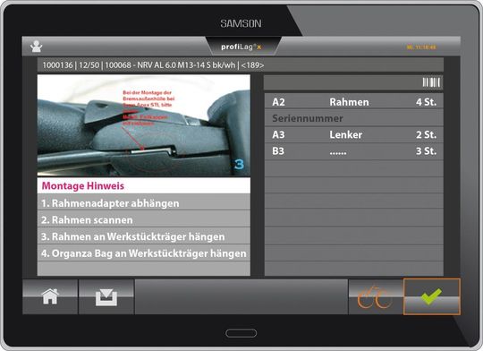 Die Displays an den Montageplätzen zeigen genau an, wann welcher Handgriff zu erledigen und welches Bauteil anzubringen ist.