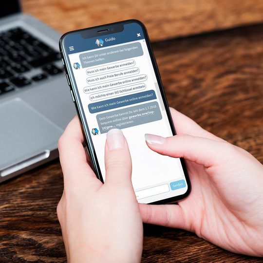 Chatbot Guido unterstützt den User dabei, in der elektronischen Gewerbeanmeldung sein Gewerbe korrekt anzugeben. Chatbot Guido unterstützt den User dabei, in der elektronischen Gewerbeanmeldung sein Gewerbe korrekt anzugeben.
