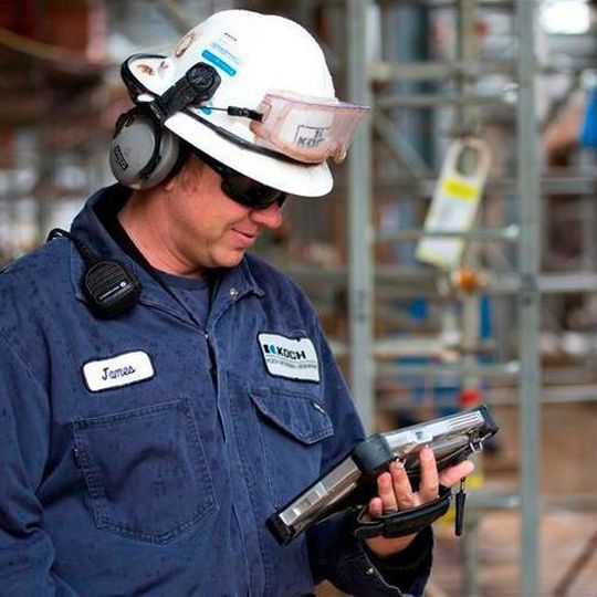 Employee working with analytics data. Employee working with analytics data.