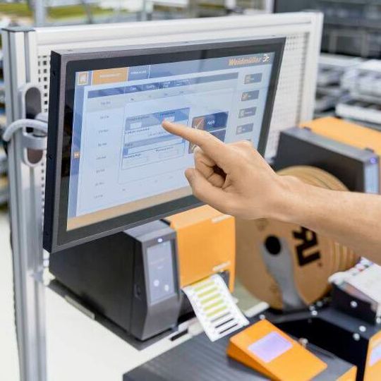 This is how digital data continuity can look like: Weidmüller's Wire Processing Center - Consistent data, no printed plans, no media breaks between individual process steps. This is how digital data continuity can look like: Weidmüller's Wire Processing Center - Consistent data, no printed plans, no media breaks between individual process steps.
