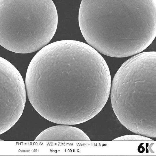 An SEM microscopic image of 6K sustainable powders depicting high sphericity and no satellites. An SEM microscopic image of 6K sustainable powders depicting high sphericity and no satellites.