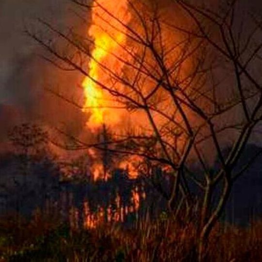 The massive fire at the oil well in Assam could be seen from 10 km away. The massive fire at the oil well in Assam could be seen from 10 km away.