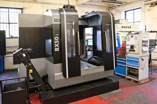 Two views of the Hurco BX50i machining centre purchased by Moorland Toolmaking to extend the width of mould tool it can produce. Two views of the Hurco BX50i machining centre purchased by Moorland Toolmaking to extend the width of mould tool it can produce.