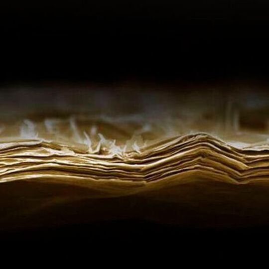 This SEM image shows an as-prepared lamellar membrane out of Mxene before exposure to water/light/heat. This SEM image shows an as-prepared lamellar membrane out of Mxene before exposure to water/light/heat.