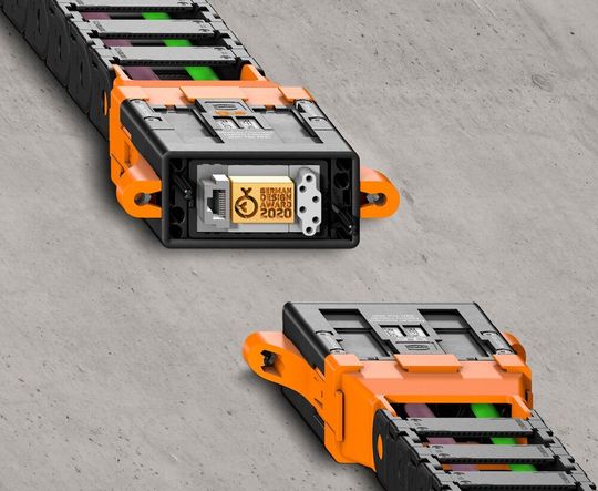 German Design Award 2021 für das Energieketten-Schnittstellenkonzept Module Connect von Igus. Energieketten können damit um 80 % schneller montiert werden. German Design Award 2021 für das Energieketten-Schnittstellenkonzept Module Connect von Igus. Energieketten können damit um 80 % schneller montiert werden.