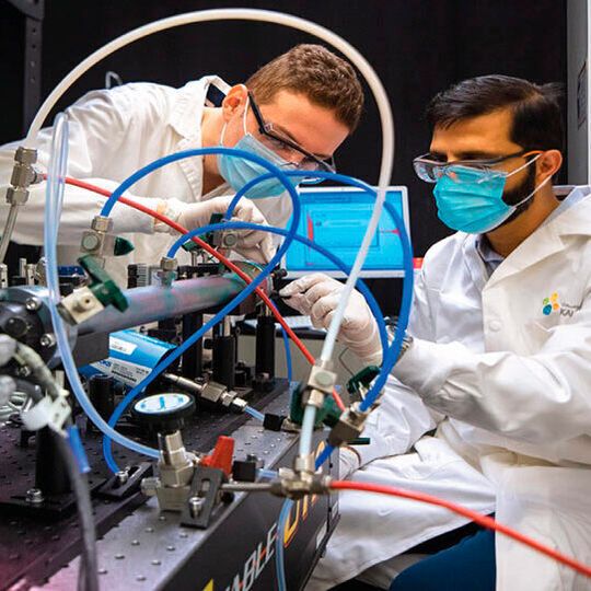 The compact laser-based sensor developed by Mhanna Mhanna (left) and Amir Farooq (right) can detect benzene at levels as low as 2 parts per billion. The compact laser-based sensor developed by Mhanna Mhanna (left) and Amir Farooq (right) can detect benzene at levels as low as 2 parts per billion.