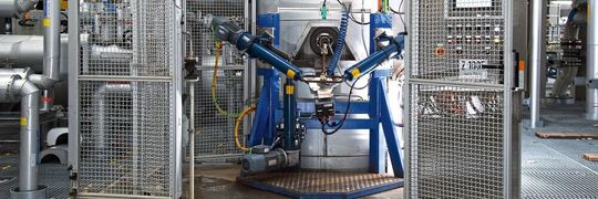 Each of the ten acetylene burners in the new plant has its own poking robot, developed by BASF's Innovative and Prototype Solutions team. Each of the ten acetylene burners in the new plant has its own poking robot, developed by BASF's Innovative and Prototype Solutions team.