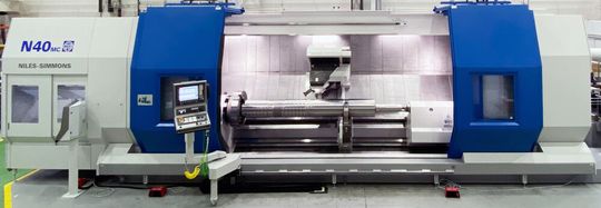 Arbeitsraum des Dreh-Fräszentrums N40MC mit Werkstück Seiltrommel. Arbeitsraum des Dreh-Fräszentrums N40MC mit Werkstück Seiltrommel.