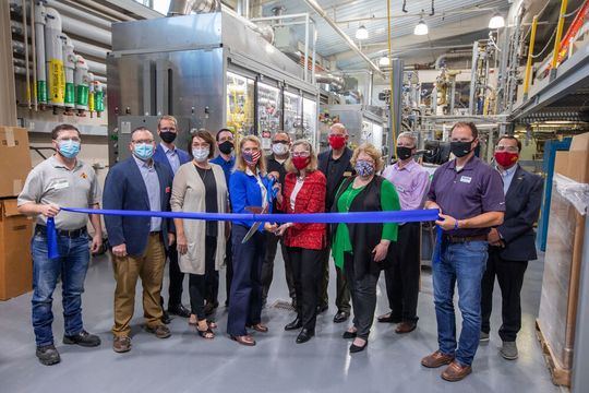REG President & CEO, CJ Warner, and ISU President, Wendy Wintersteen, prepare to cut the ribbon in celebration of their collaboration on the new hydrotreater pilot plant. Photo courtesy of Christopher Gannon, Iowa State University. REG President & CEO, CJ Warner, and ISU President, Wendy Wintersteen, prepare to cut the ribbon in celebration of their collaboration on the new hydrotreater pilot plant. Photo courtesy of Christopher Gannon, Iowa State University.