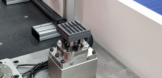 Higher dimensional accuracy, better surfaces and therefore virtually no more reworking: The example electrode with holder on the zero point clamping station of the coordinate measuring machine. Higher dimensional accuracy, better surfaces and therefore virtually no more reworking: The example electrode with holder on the zero point clamping station of the coordinate measuring machine.