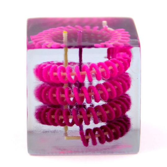 A spiraling pattern created by mixing solid and liquid 3D-printed materials. A spiraling pattern created by mixing solid and liquid 3D-printed materials.