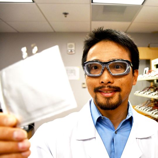 Associate Professor Feng Lin of the Virginia Tech Department of Chemistry holds a pouch battery cell in his battery-testing lab at Davidson Hall. Photo for Virginia Tech by Steven Mackay. Associate Professor Feng Lin of the Virginia Tech Department of Chemistry holds a pouch battery cell in his battery-testing lab at Davidson Hall. Photo for Virginia Tech by Steven Mackay.
