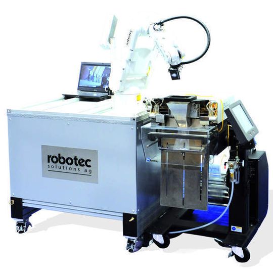 Kompakte Anlage für kleine Produkte sorgt für Produktzuführung, Qualitätskontrolle, Kennzeichnung und Verpackung. Bild: Robotec Kompakte Anlage für kleine Produkte sorgt für Produktzuführung, Qualitätskontrolle, Kennzeichnung und Verpackung. Bild: Robotec