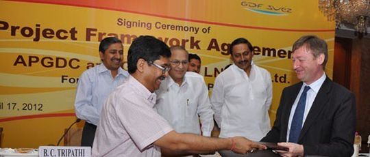 Sutirtha Bhattacharya, Principal Secretary of the Government of Andhra Pradesh and Philip Olivier, President & CEO, GDF Suez LNG UK exchanging documents in presence of S. Jaipal Reddy, India's Minister of Petroleum and Natural Gas. Sutirtha Bhattacharya, Principal Secretary of the Government of Andhra Pradesh and Philip Olivier, President & CEO, GDF Suez LNG UK exchanging documents in presence of S. Jaipal Reddy, India's Minister of Petroleum and Natural Gas.