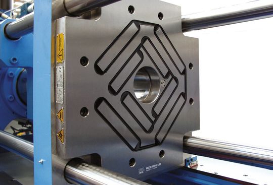 This M-TECS magnetic clamping plate from Römheld is mounted on a 110-ton injection moulding press. This M-TECS magnetic clamping plate from Römheld is mounted on a 110-ton injection moulding press.