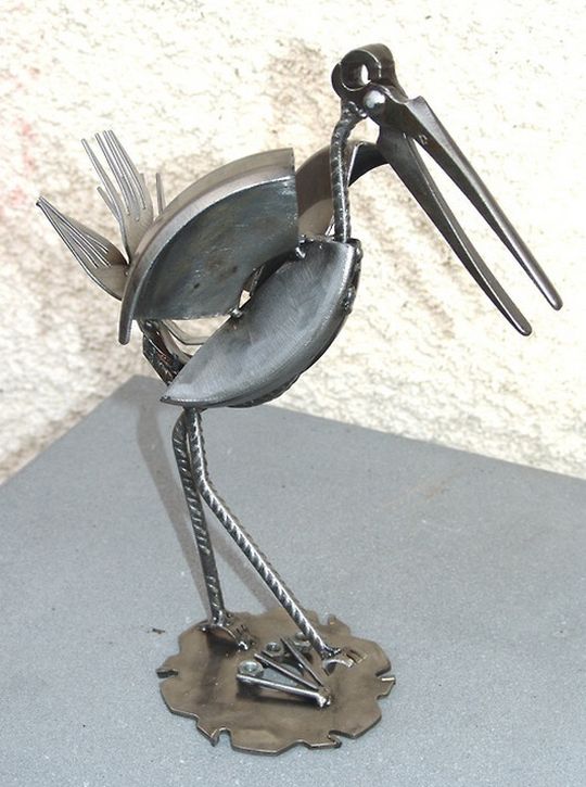 «CotCot» a une hauteur de 27cm. «CotCot» a une hauteur de 27cm.