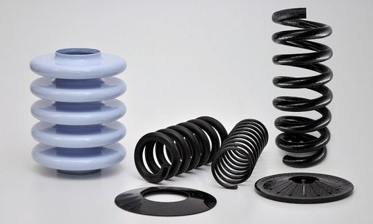 Niedriges Gewicht und und hohe Energieaufnahme sprechen für Federn aus faserverstärkten Kunststoffen statt aus Metallen. Auf die Federcharakteristik kann unabhängig von der Federgeometrie Einfluss genommen werden. Niedriges Gewicht und und hohe Energieaufnahme sprechen für Federn aus faserverstärkten Kunststoffen statt aus Metallen. Auf die Federcharakteristik kann unabhängig von der Federgeometrie Einfluss genommen werden.