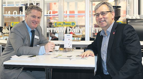 Alain Reynvoet (r), European Managing Director of Haas Automation, outlines growth plans in 5-axis machining with ETMM Publisher Ken Fouhy at EuroMold in Frankfurt, Germany. Alain Reynvoet (r), European Managing Director of Haas Automation, outlines growth plans in 5-axis machining with ETMM Publisher Ken Fouhy at EuroMold in Frankfurt, Germany.
