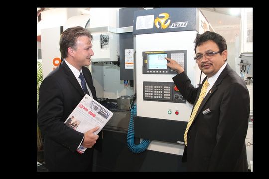 P.G. Jadeja (r.), CEO of Indian machine tool maker Jyoti, explains one of his company’s machines at the Imtex/Tooltech exhibition in Bangalore, India. P.G. Jadeja (r.), CEO of Indian machine tool maker Jyoti, explains one of his company’s machines at the Imtex/Tooltech exhibition in Bangalore, India.
