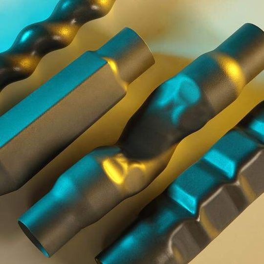 Am IWU entwickelte warmumgeformte Bauteile (von links: pressgehärtetes Wellenrohr, Modellgemeometrie, Abgasbauteil sowie Crashbox) Am IWU entwickelte warmumgeformte Bauteile (von links: pressgehärtetes Wellenrohr, Modellgemeometrie, Abgasbauteil sowie Crashbox)