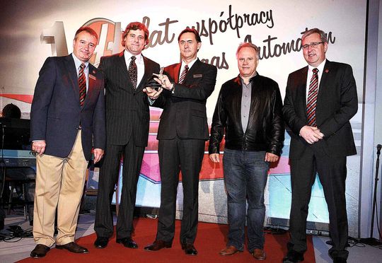 Company founder Gene Haas (2nd from r.) and others celebrate the 10th anniversary of the company’s Polish factory outlet. Company founder Gene Haas (2nd from r.) and others celebrate the 10th anniversary of the company’s Polish factory outlet.