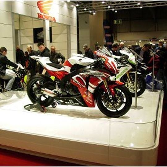 Honda Heinen mit zwei für den Motorsport getunten Motorräder auf der Messe Motorräder Dortmund 2013. Honda Heinen mit zwei für den Motorsport getunten Motorräder auf der Messe Motorräder Dortmund 2013.