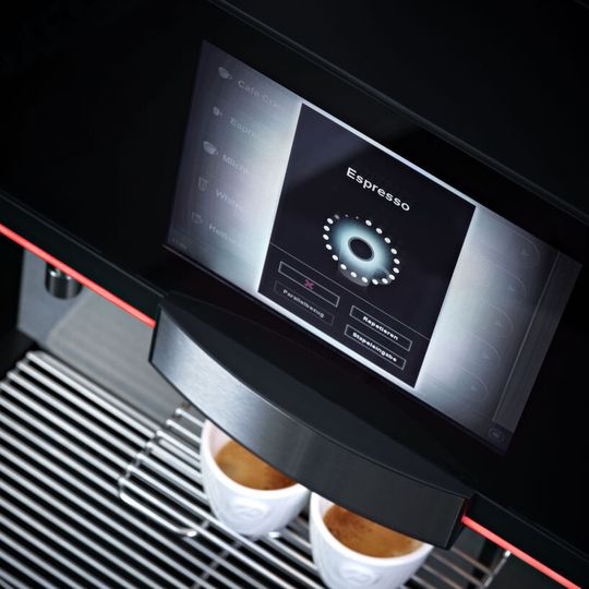 Die Benutzerführung des Melitta-Kaffeeautomaten bar-cube touch wurde vom Kieler Interaktionsspezialisten macio gestaltet. Die Benutzerführung des Melitta-Kaffeeautomaten bar-cube touch wurde vom Kieler Interaktionsspezialisten macio gestaltet.