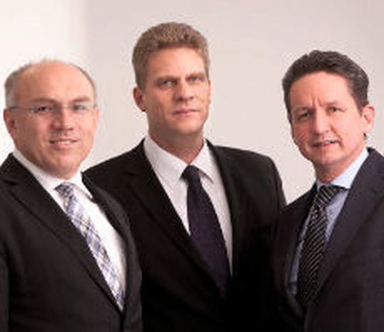 Die Geschäftsführung seit 1. Juli 2013: Dr. Roland Hartmann, Matthias Rommel, Olaf J. Müller