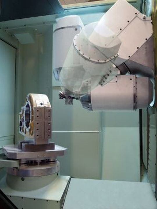A swivel head for machining complex workpieces in one setting is said to suit tool and mould making. A swivel head for machining complex workpieces in one setting is said to suit tool and mould making.