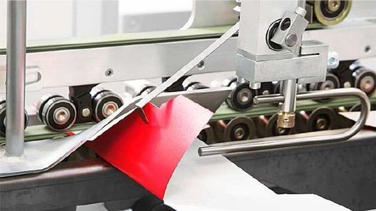 Fig 12. Détail galets plieuse-colleuse Bobst.