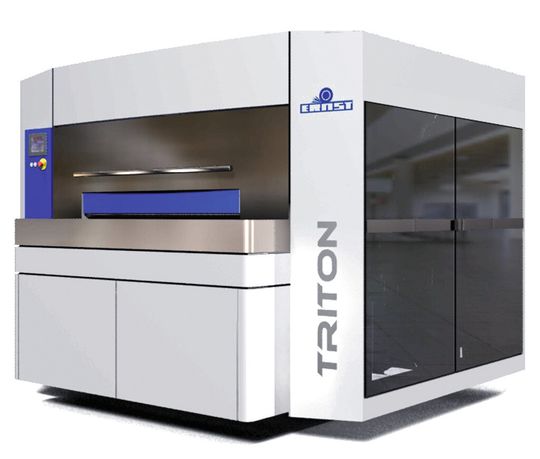 Die neue Blechentgratungsmaschine «Triton». Die neue Blechentgratungsmaschine «Triton».