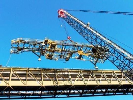 Fig. 1: New gantry structure encloses existing skyline gantry system. Fig. 1: New gantry structure encloses existing skyline gantry system.