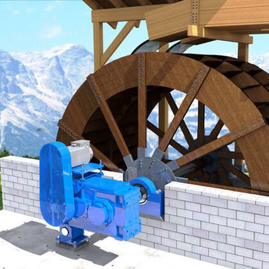 Damit das Mühlenrad die Wasserkraft in Energie umsetzen kann, wird ein integriertes Antriebssystem ais Synchronmotor und Getriebe eingesetzt.