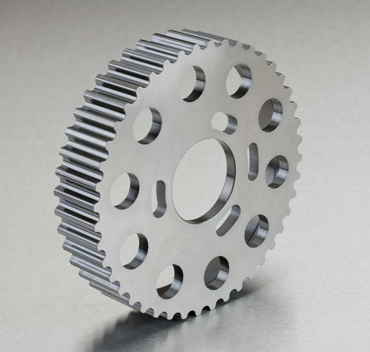 Prototyp eines Zahnriemenrads aus Duroplast für den Antrieb einer Nockenwelle. Prototyp eines Zahnriemenrads aus Duroplast für den Antrieb einer Nockenwelle.