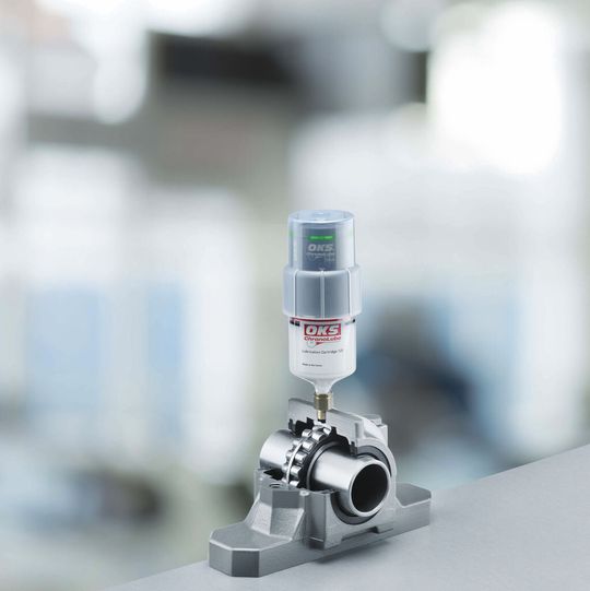 Das Chrono-Lube-System wird auf die Schmierstelle montiert und die Spendezeit entsprechend den Anforderungen eingestellt. Das Chrono-Lube-System wird auf die Schmierstelle montiert und die Spendezeit entsprechend den Anforderungen eingestellt.