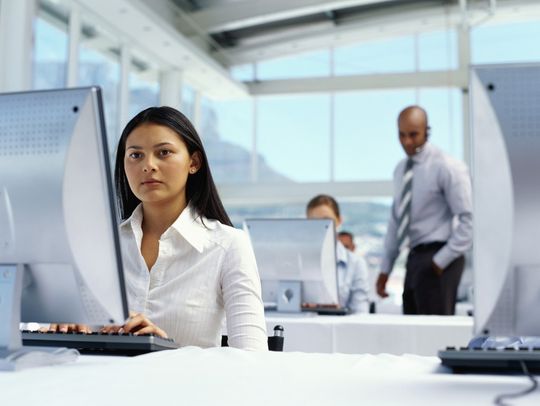 Portrait of a businesswoman using a computer Portrait of a businesswoman using a computer