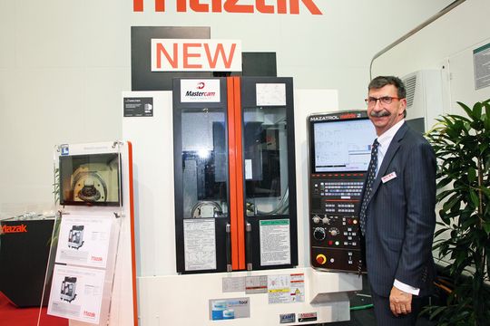 Ideal für kleine Betriebe: Wenk-Geschäftsführer Norbert Müller präsentiert die Europa-Premiere von Mazak auf der Prodex 2014 in Basel – das vertikale Fräszentrum VC Nexus Compact für die präzise Bearbeitung hochkomplexer kleiner Werkstücke aus schwer zu bearbeitenden Werkstoffen. Ideal für kleine Betriebe: Wenk-Geschäftsführer Norbert Müller präsentiert die Europa-Premiere von Mazak auf der Prodex 2014 in Basel – das vertikale Fräszentrum VC Nexus Compact für die präzise Bearbeitung hochkomplexer kleiner Werkstücke aus schwer zu bearbeitenden Werkstoffen.