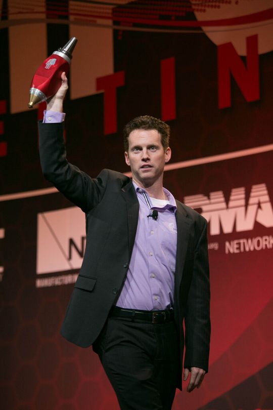 Jason Jones (CEO and Co-Founder of Hybrid Manufacturing Technologies, Ltd.) with his innovation, the Hybrid-kit, that can be integrated into any old or new metal-working CNC machine. Jason Jones (CEO and Co-Founder of Hybrid Manufacturing Technologies, Ltd.) with his innovation, the Hybrid-kit, that can be integrated into any old or new metal-working CNC machine.