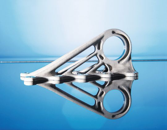 Additively manufactured titanium bracket onboard the Airbus A350 XWB. A new aircraft design requires thousands of these. Additively manufactured titanium bracket onboard the Airbus A350 XWB. A new aircraft design requires thousands of these.
