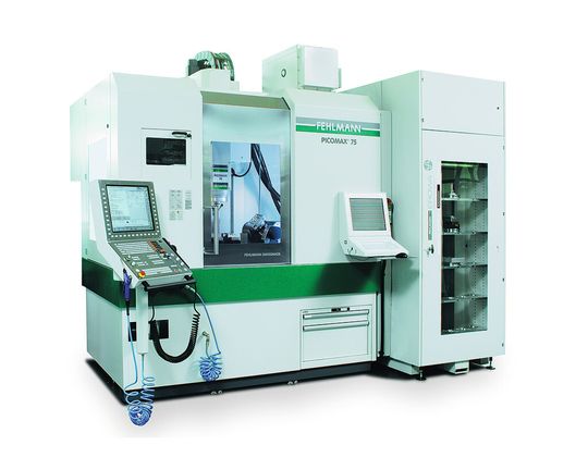 Fehlmann Picomax 75 with Erowa Robot Compact workpiece handling system. The machine can be automated without compromising its accessibility. Fehlmann Picomax 75 with Erowa Robot Compact workpiece handling system. The machine can be automated without compromising its accessibility.