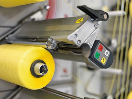 Die Starlinger & Co. GmbH, Wien, produziert Maschinen und Prozesstechnik für die Herstellung gewebter Kunststoffsäcke. Im Bild der Präzisionskreuzspuler Lintape. Die Starlinger & Co. GmbH, Wien, produziert Maschinen und Prozesstechnik für die Herstellung gewebter Kunststoffsäcke. Im Bild der Präzisionskreuzspuler Lintape.