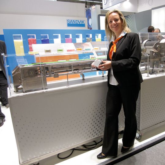Sandvik's Gundula Eckhardt proudly shows the company's Rotoform 4G system running at the stand Sandvik's Gundula Eckhardt proudly shows the company's Rotoform 4G system running at the stand